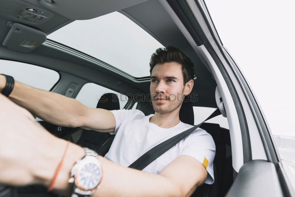 Similar – Taxi driver in a mask with a client on the back seat wearing mask