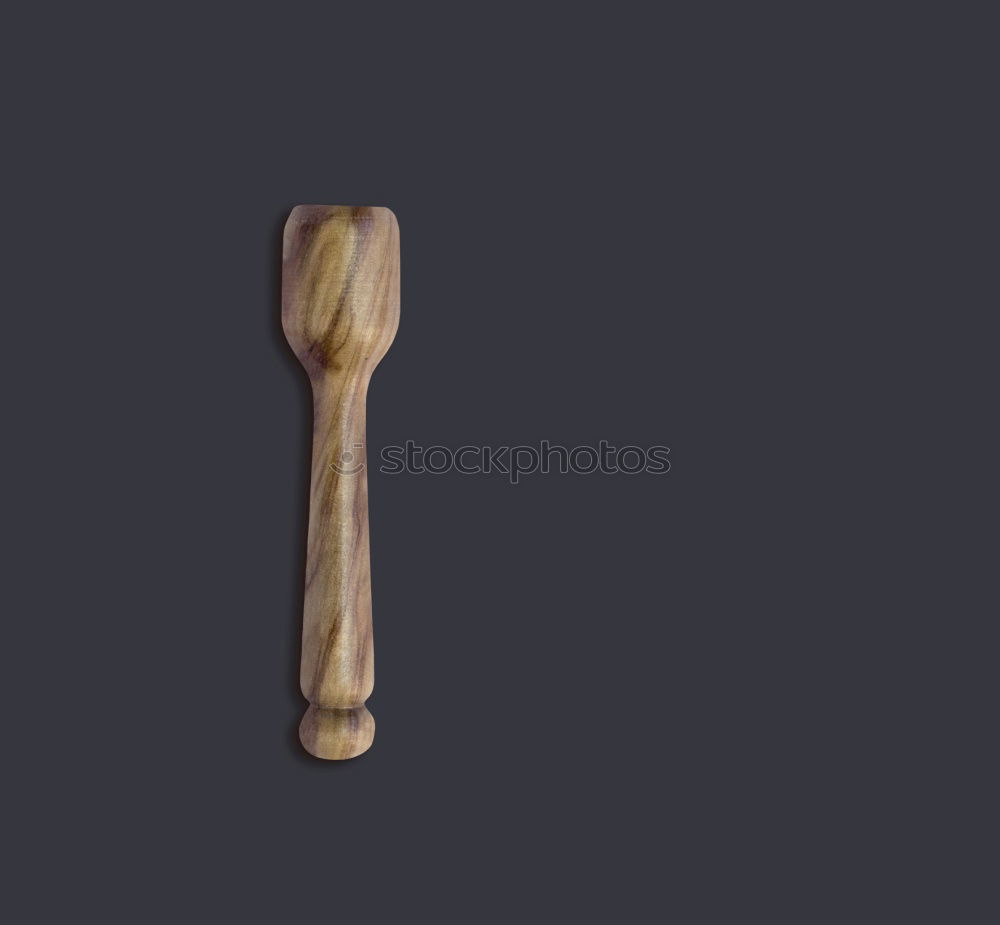 Similar – rolling pin on black wood as background