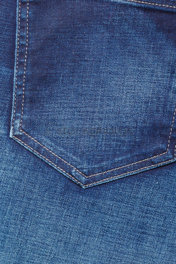 Similar – Textur-Tasche einer blauen, zerknitterten Jeans Makro-Nahaufnahme