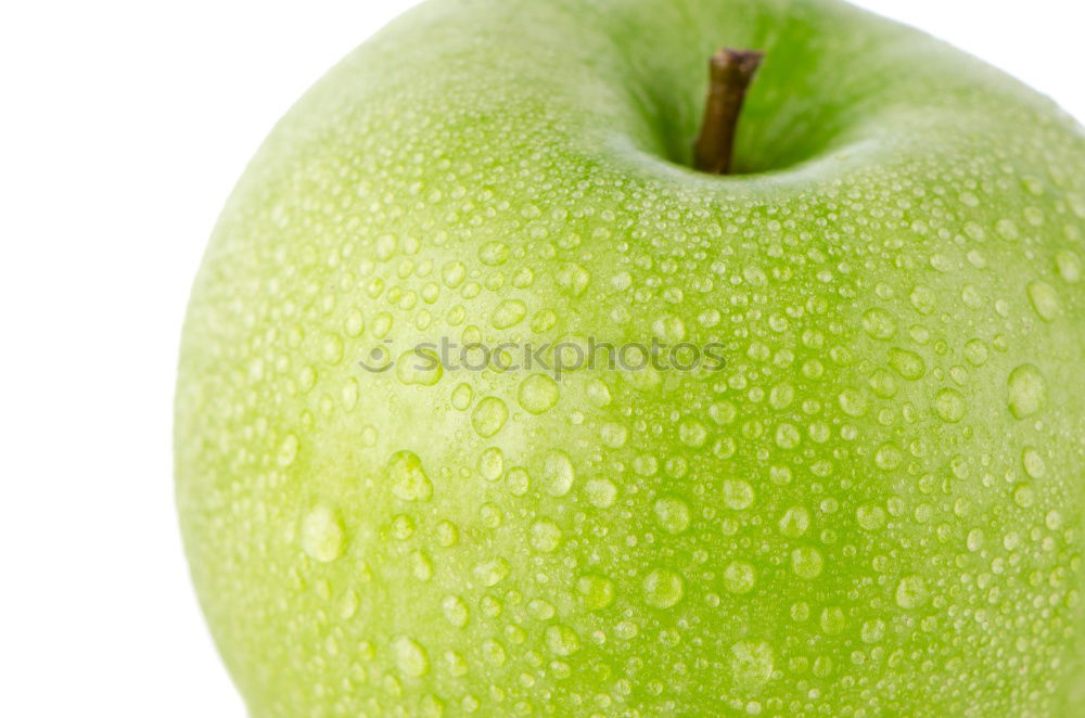 Similar – Apple slice on a green area