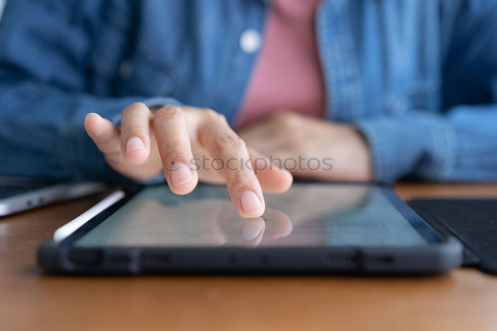 Similar – Woman with cup and smartphone in outside cafe