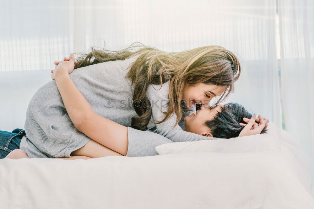 Similar – Image, Stock Photo Lesbian couple kissing in the bathroom of their home