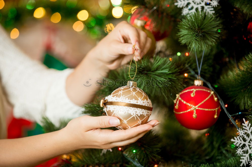 Similar – Image, Stock Photo Child looking down at present under Christmas tree