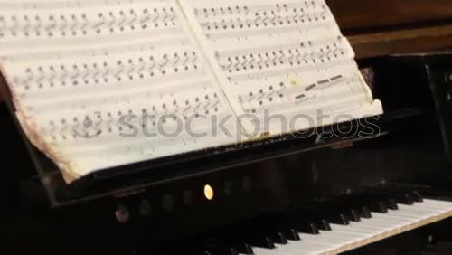 Similar – Image, Stock Photo old piano with a lot of white keys and black ones in the spaces in between