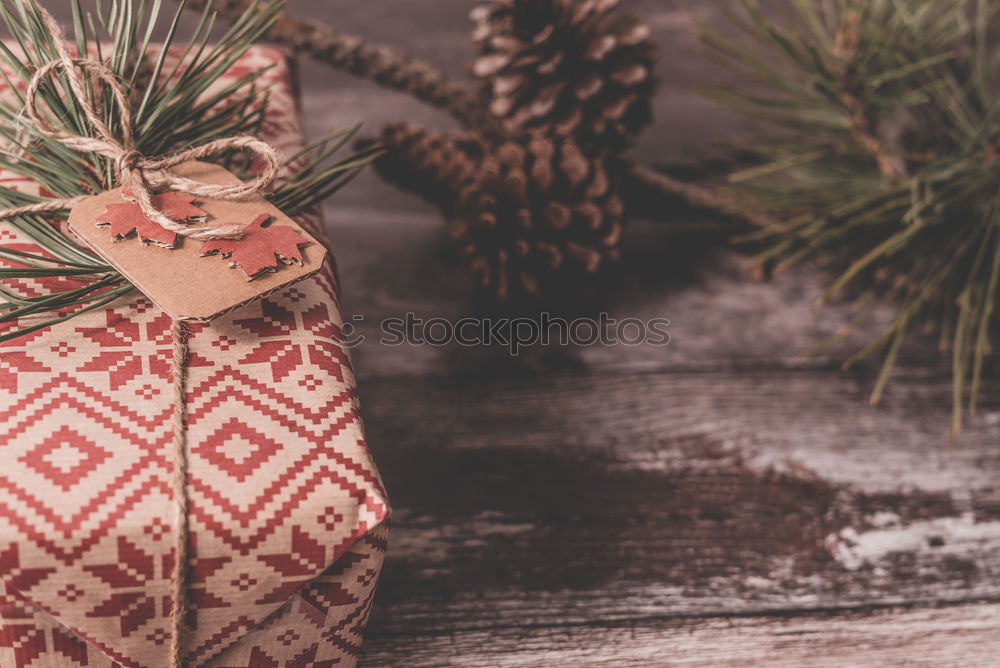 Similar – Woman arms doing christmas decoration in a wood table outdoors