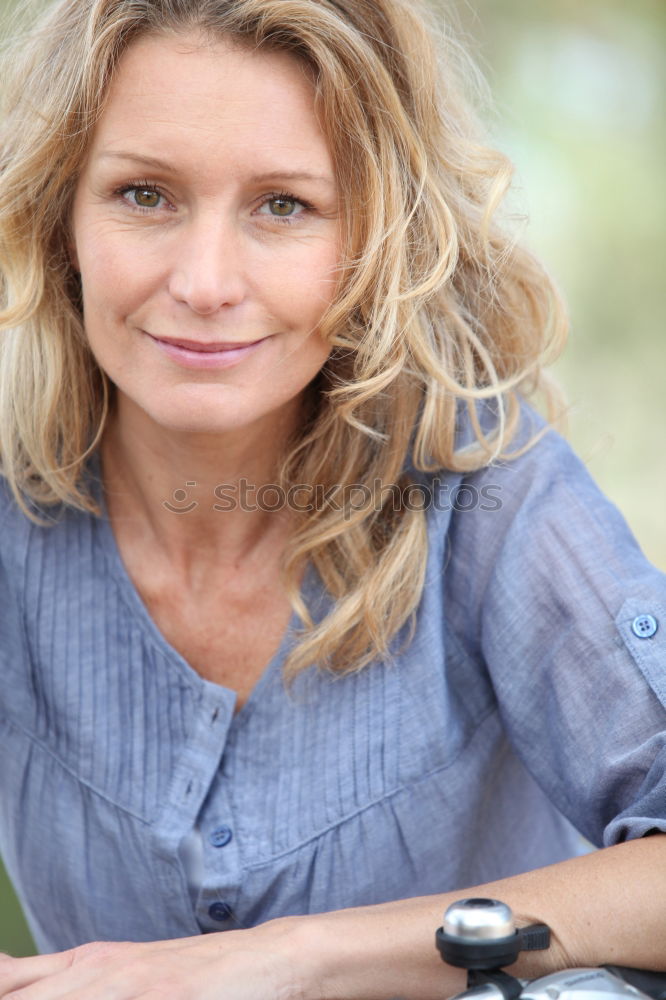 Similar – Middle Aged Woman Smiling Outdoors Portrait