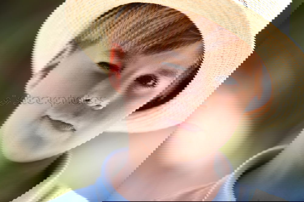 Similar – Image, Stock Photo Boy in hat looks away happy