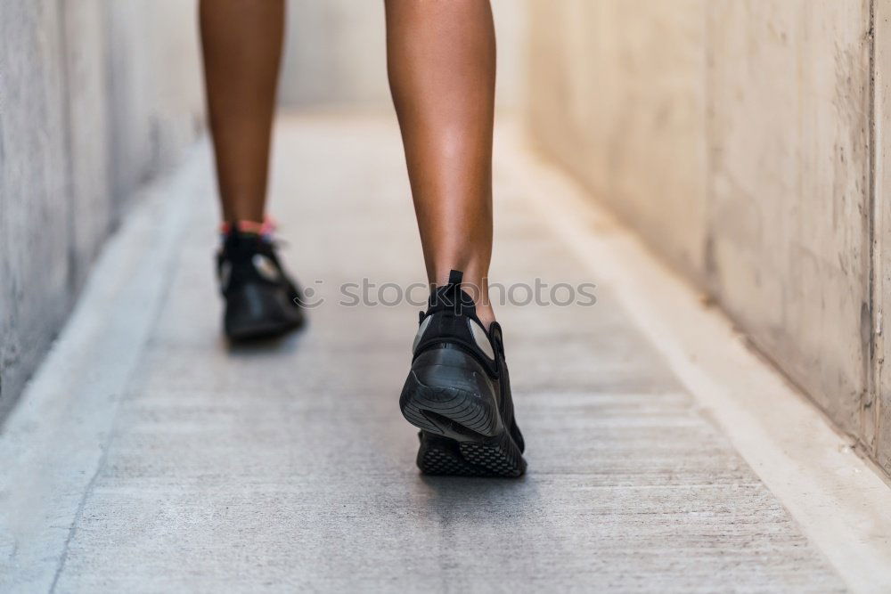 Similar – Ballerinas legs in black pointes on wooden floor in point position