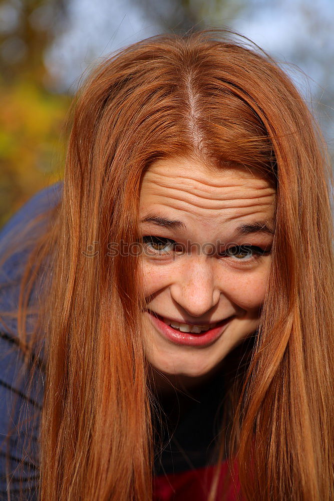 Similar – Image, Stock Photo Portrait of a young, blond, freckled woman smiling at the camera
