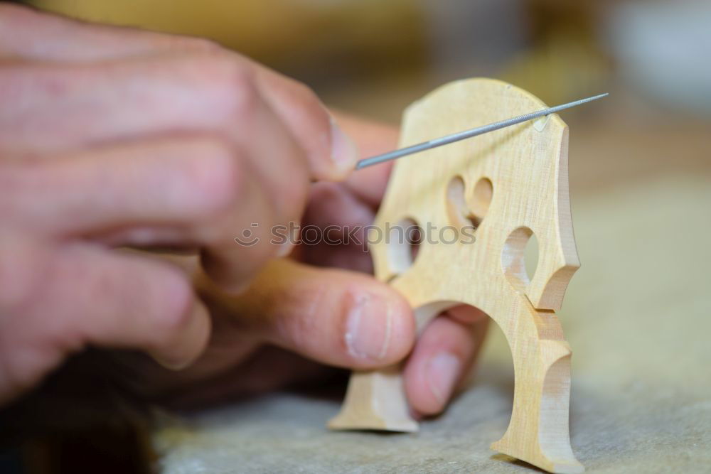 Similar – Craftsman working in his workshop wooden boxes