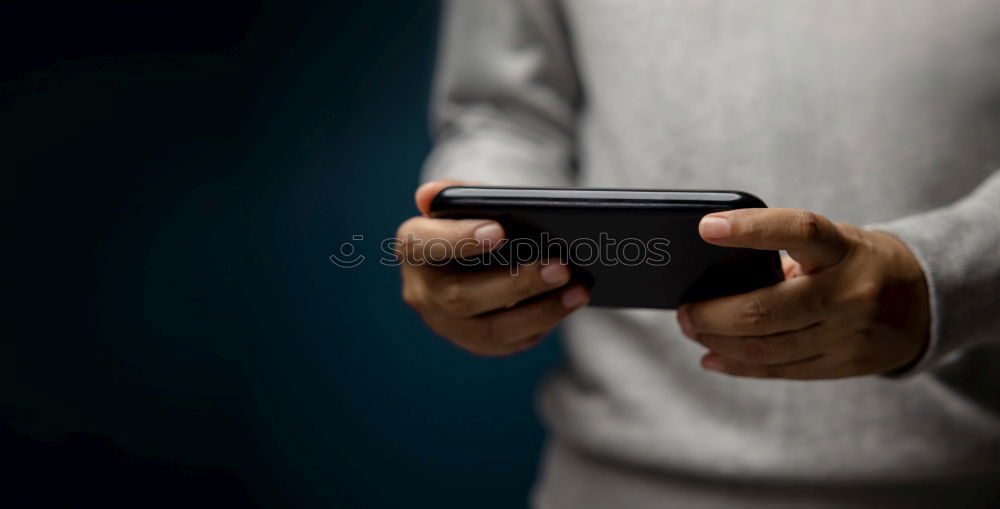 Similar – Image, Stock Photo Hands of a Young woman, Holding a smartphone