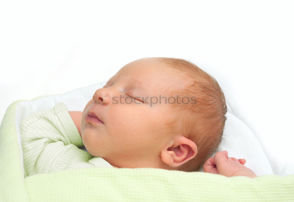 Similar – baby sleeping on his mother’s shoulder