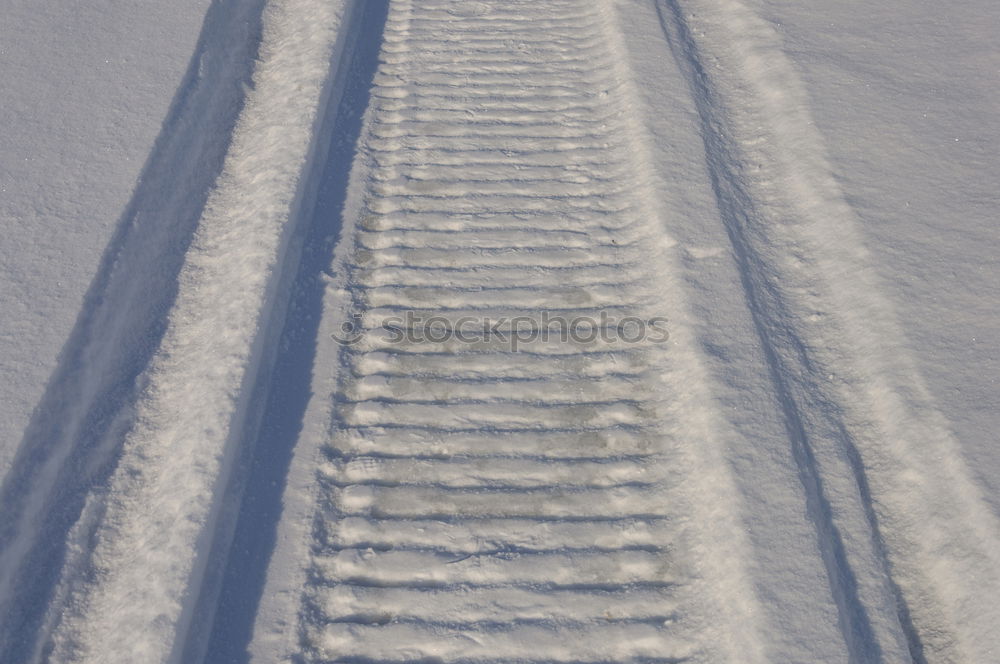 Similar – Foto Bild reifenspuren im schnee