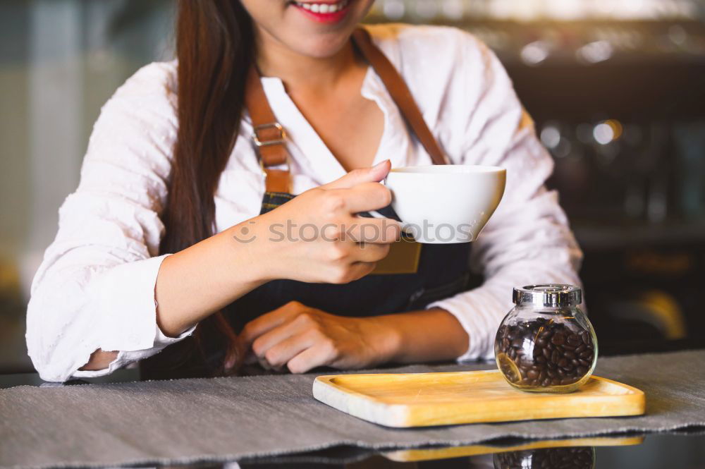 Image, Stock Photo Barista holds out a Cup of coffee