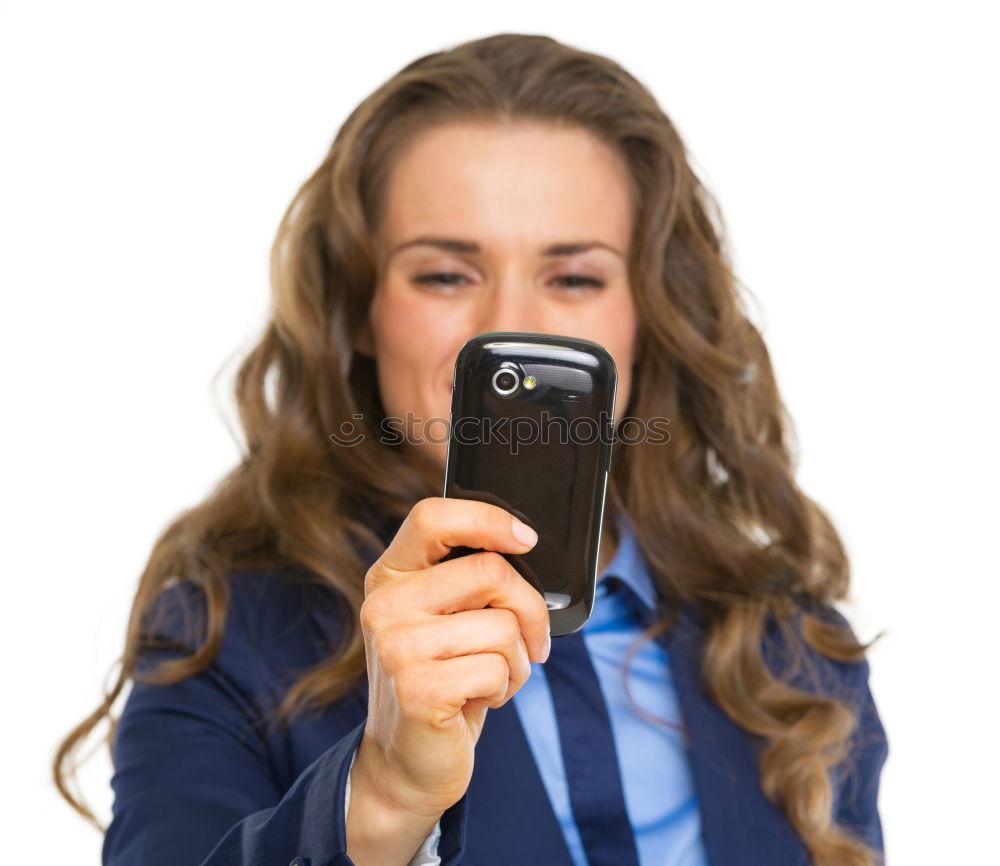 Similar – Image, Stock Photo Teen holds cell phone in front of mouth with picture of his mouth