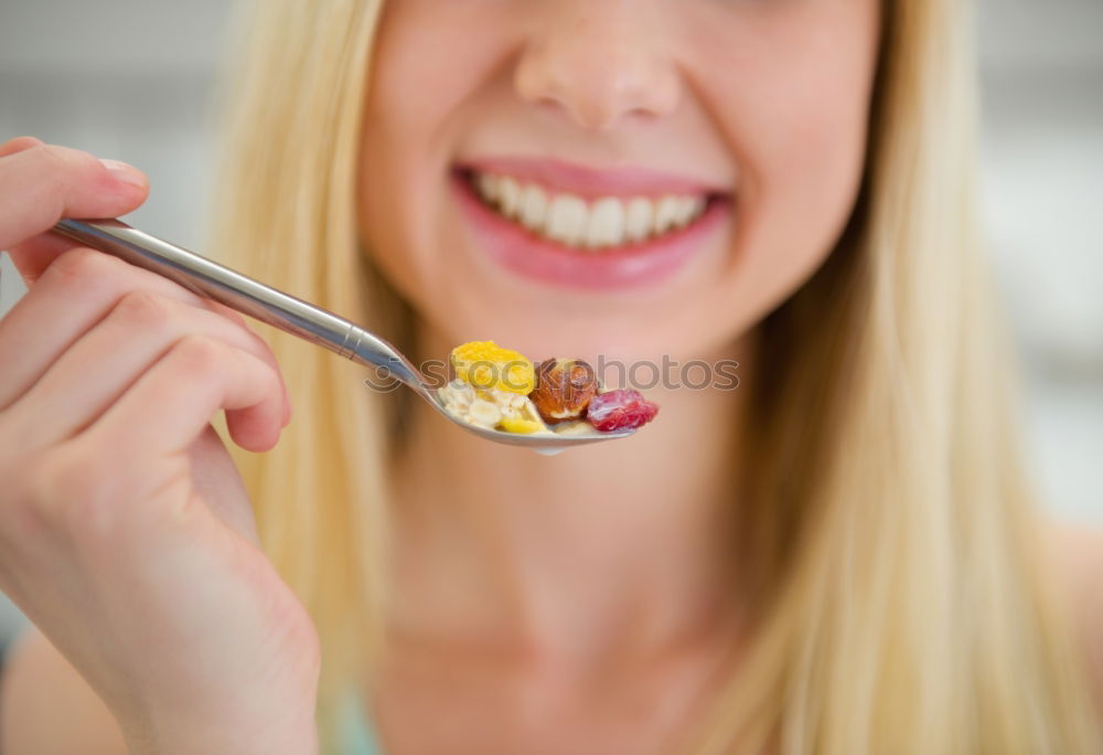 Similar – Crop woman eating sushi