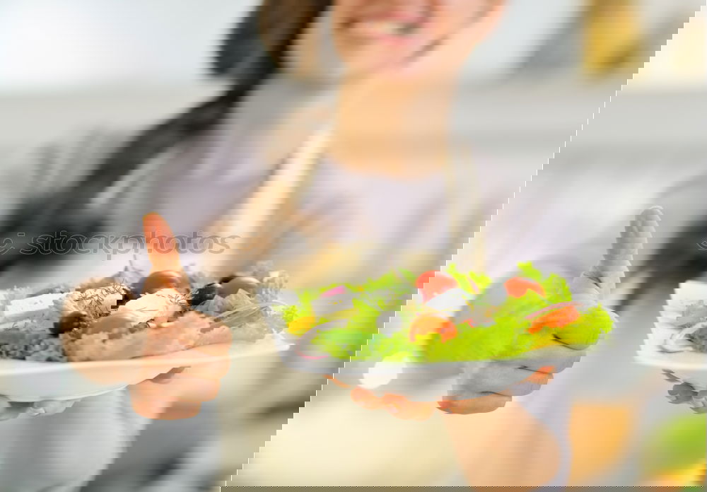 Similar – Image, Stock Photo Woman eating quinoa and vegetables in bowl