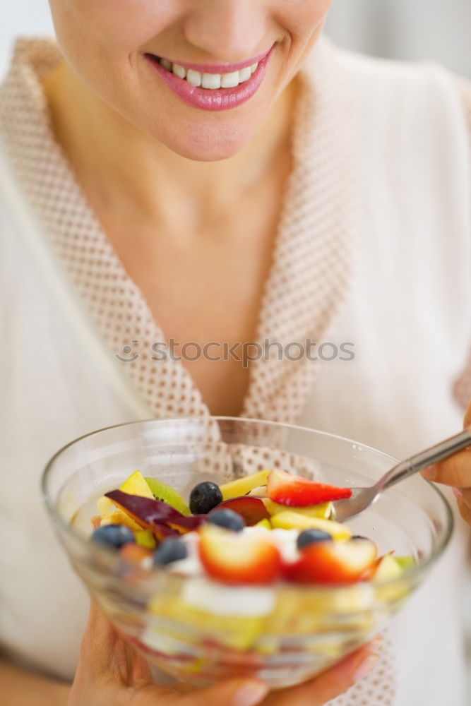 Similar – Image, Stock Photo Crop woman close up eating oat and fruits bowl for breakfast