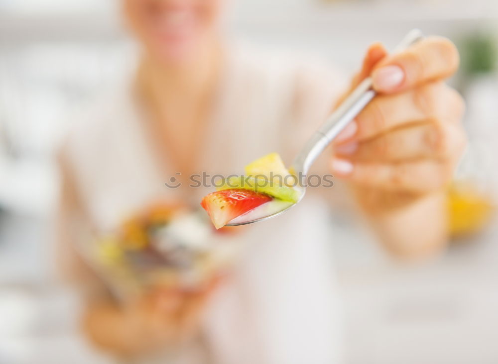 Similar – Crop woman eating sushi