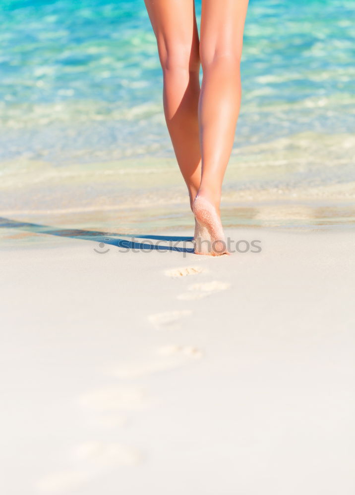 Similar – man takes a beach walk