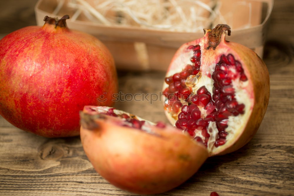 Similar – Pomegranate on vintage wooden table