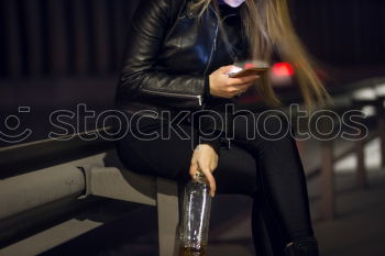 Similar – Young girl sitting on the floor and smoke