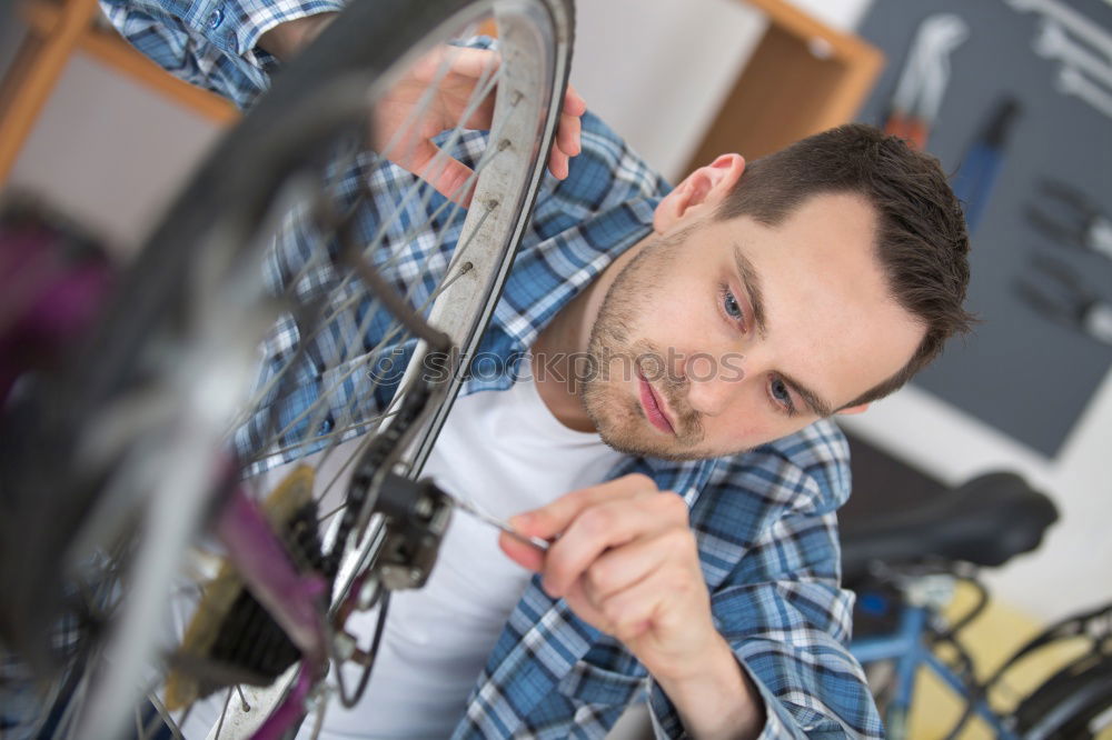 Similar – Mechachical worker take tool in Garage