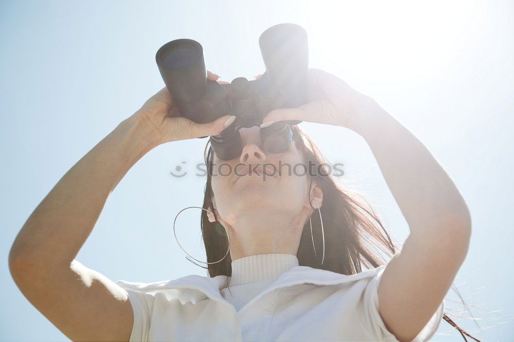 Similar – young brunette woman on a lifeguard tower