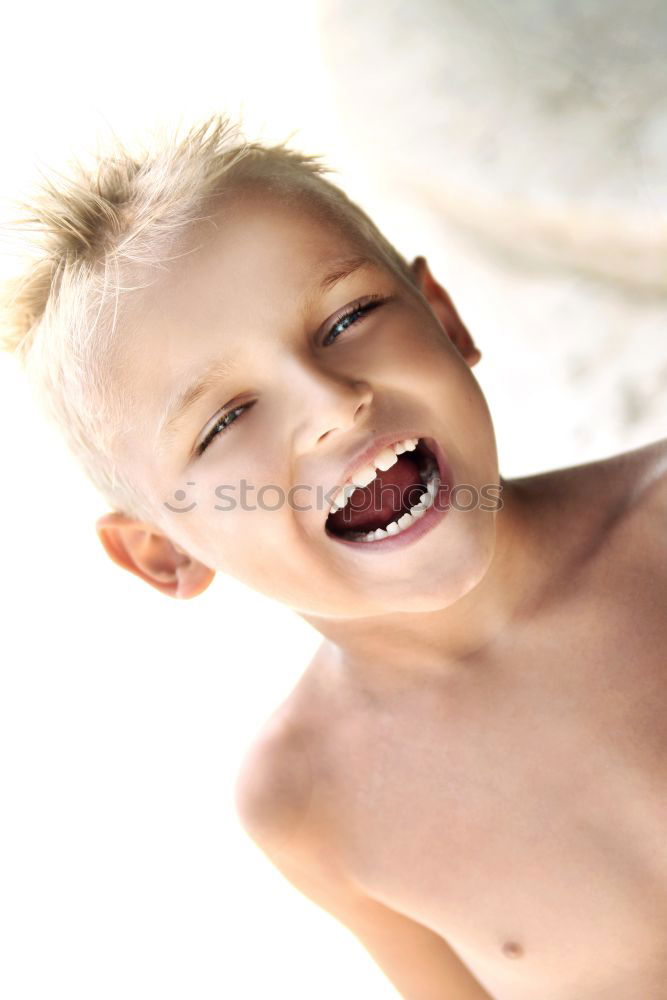 Image, Stock Photo Mother and son playing on the beach at the day time.