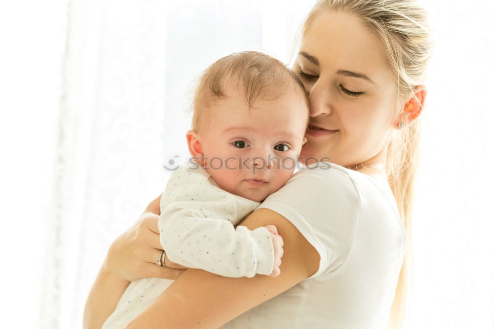 Similar – Image, Stock Photo Portrait of a mother with her baby at home.