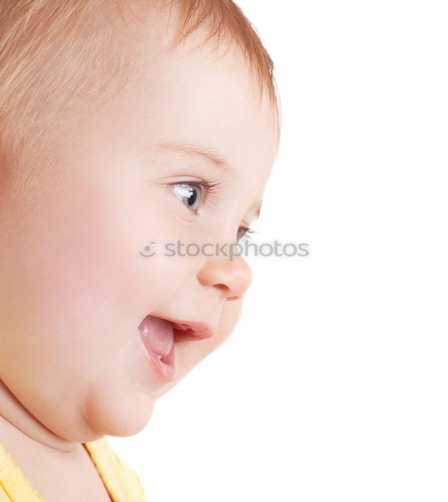 Amazed toddler in detail with open mouth and big eye