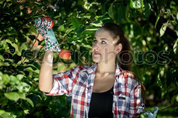 Similar – Image, Stock Photo An apple a day … Young woman eating an apple with relish