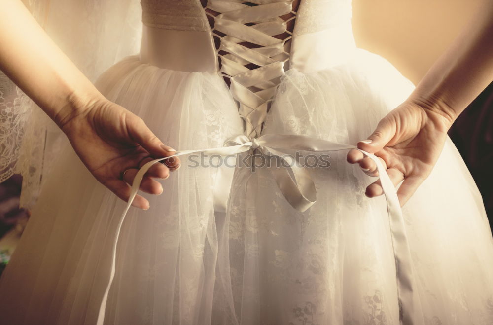 Similar – Image, Stock Photo Close-up of female fashion designer working with textiles