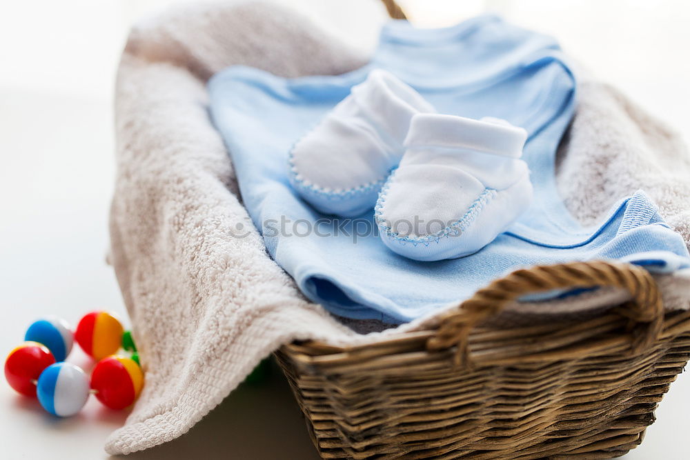 Similar – Baby bibs on laundry