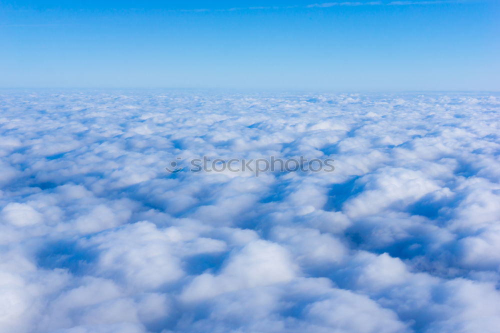 Similar – Natural background: clouds see from the airplane.