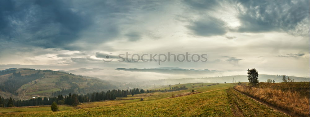 Similar – Image, Stock Photo autumn panorama in mountain hills. Village in October valley