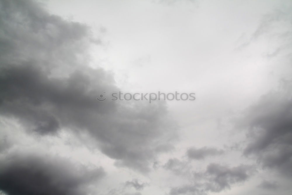 Similar – Foto Bild Wolken am Mittag