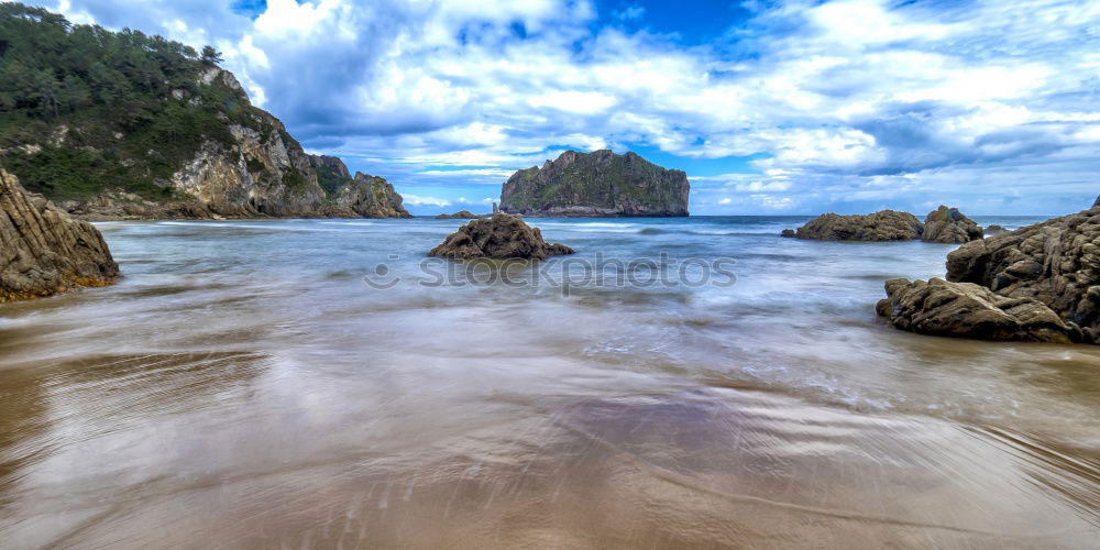 Similar – Sandy shore and mountains