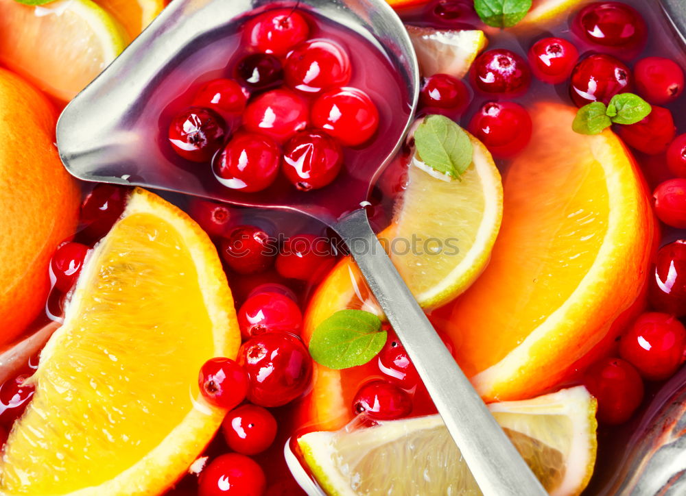 Cocktail with fruits and berries