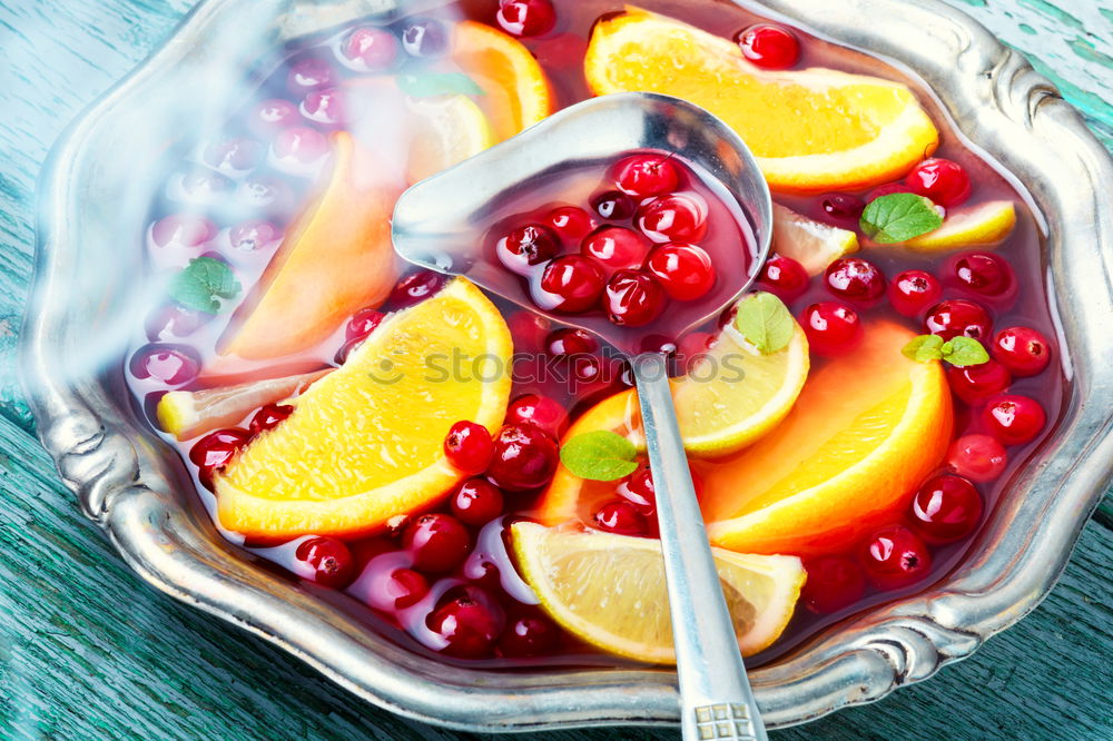 Cocktail with fruits and berries