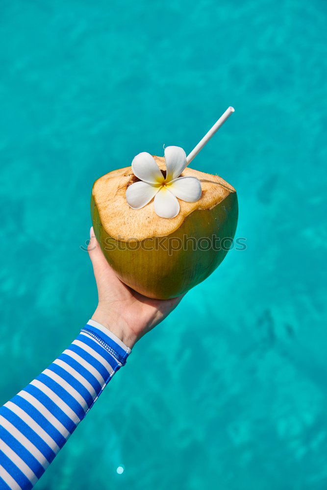 Similar – Fresh coconut by the swimming pool