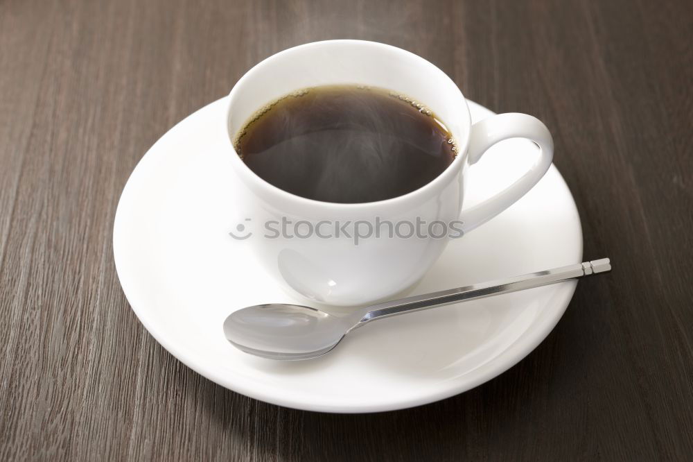 Similar – Hands with coffee cups on table in a urban cafe.