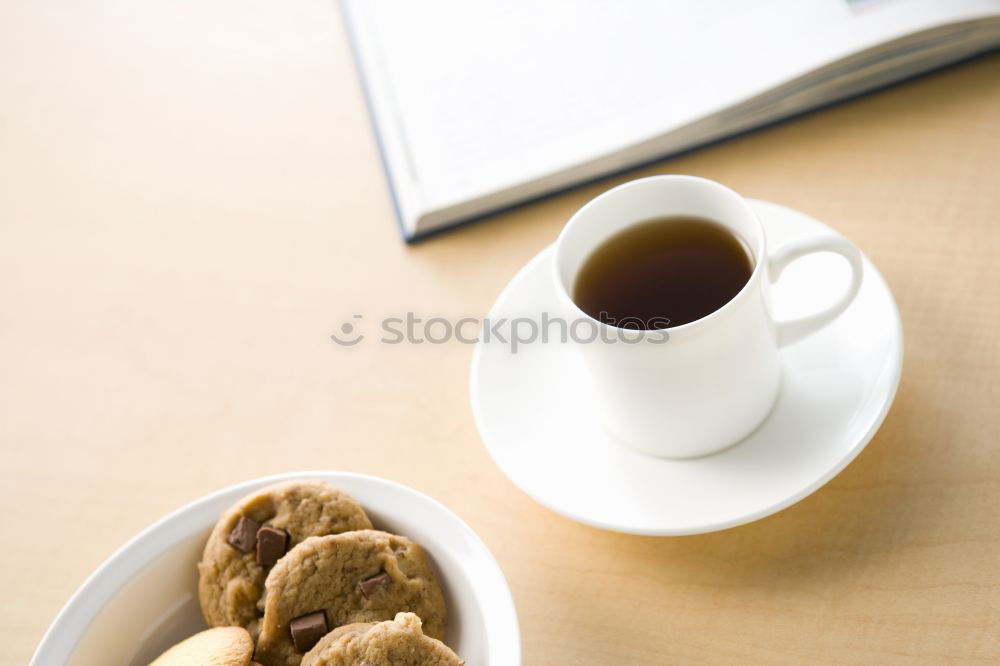 Similar – Image, Stock Photo A few books with cup of coffee and cookies on wooden floor