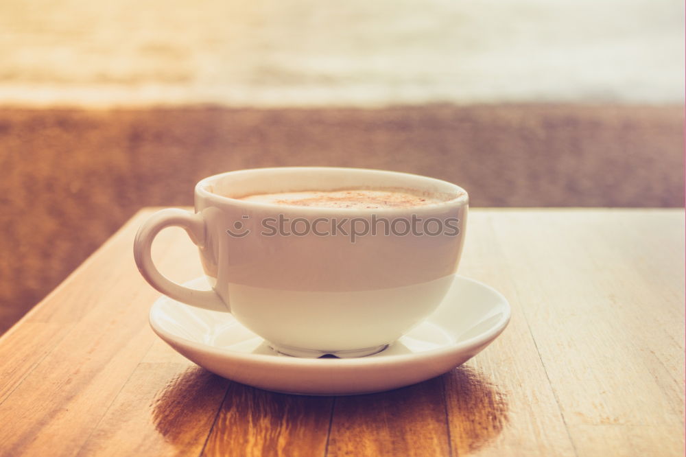 Similar – Image, Stock Photo Two woman hands hold big cup of green tea over canvas