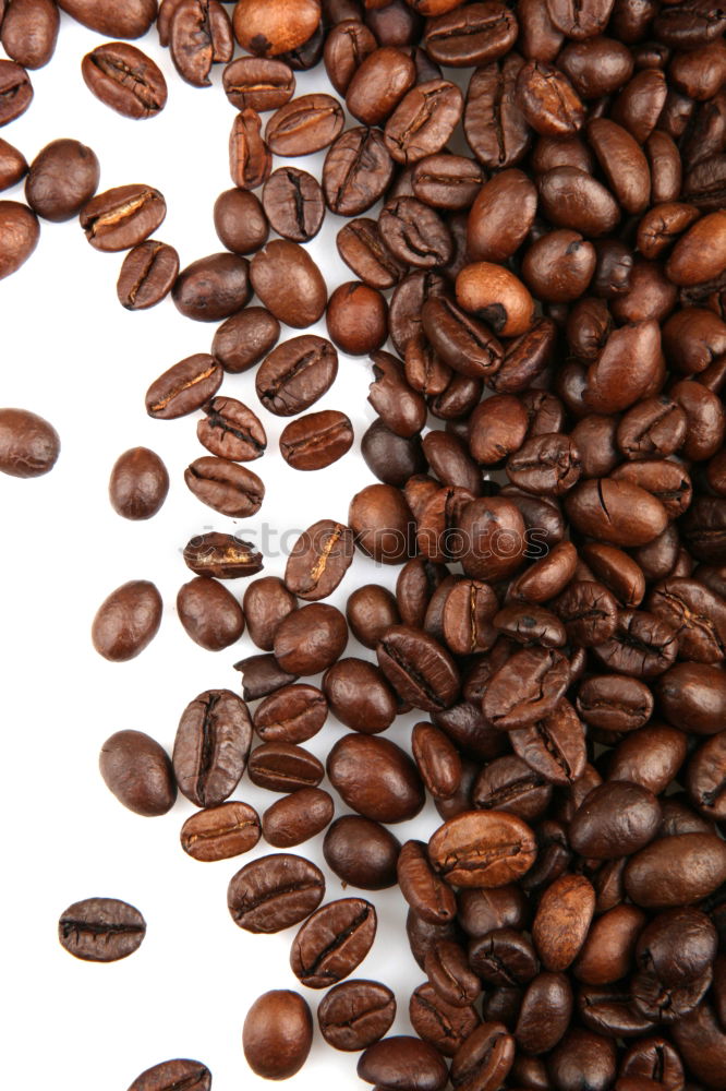 Similar – Coffee beans on wooden table background