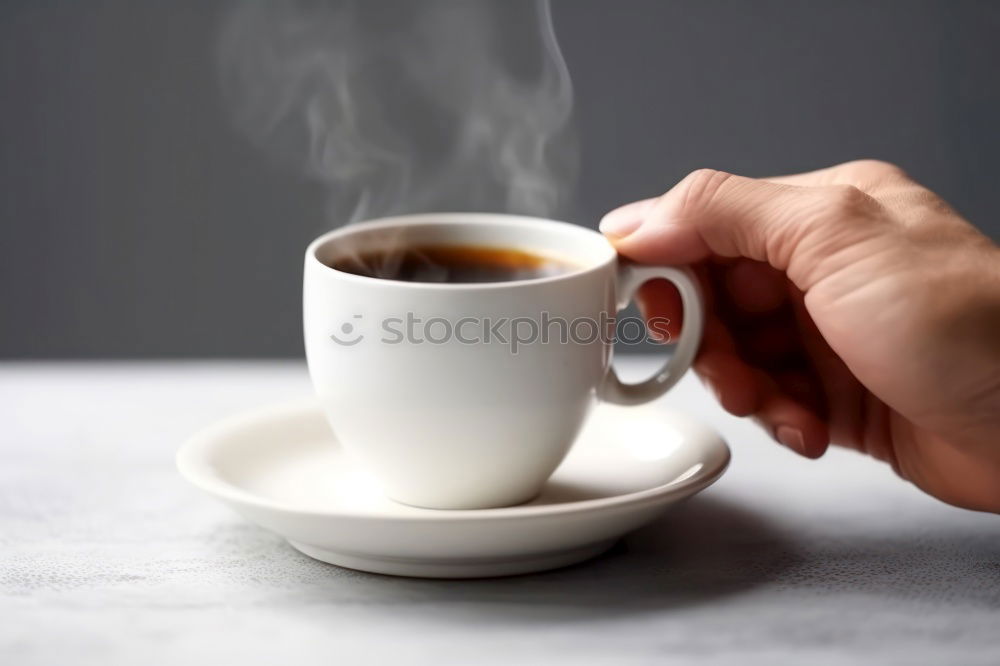 Image, Stock Photo Hand hold very small cup of coffee.