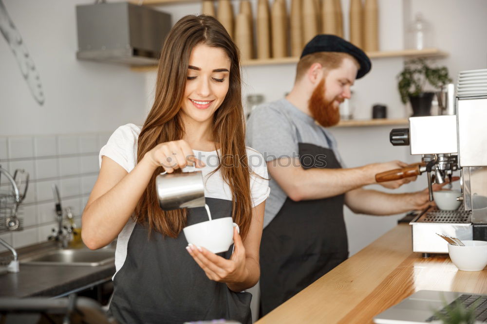 Similar – Image, Stock Photo smiling young Barista making coffee in cafe