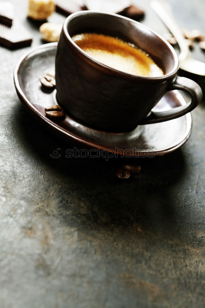 Similar – Cup of coffee on old wooden table with kitchen towel