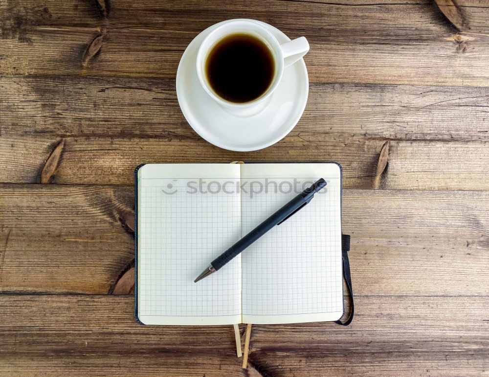 Similar – Blue office: note with pencil, sharpener, paper clips, eraser and a coffee cup