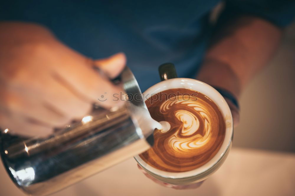 Similar – Image, Stock Photo Barista pouring hot milk prepare latte art on cup of coffee